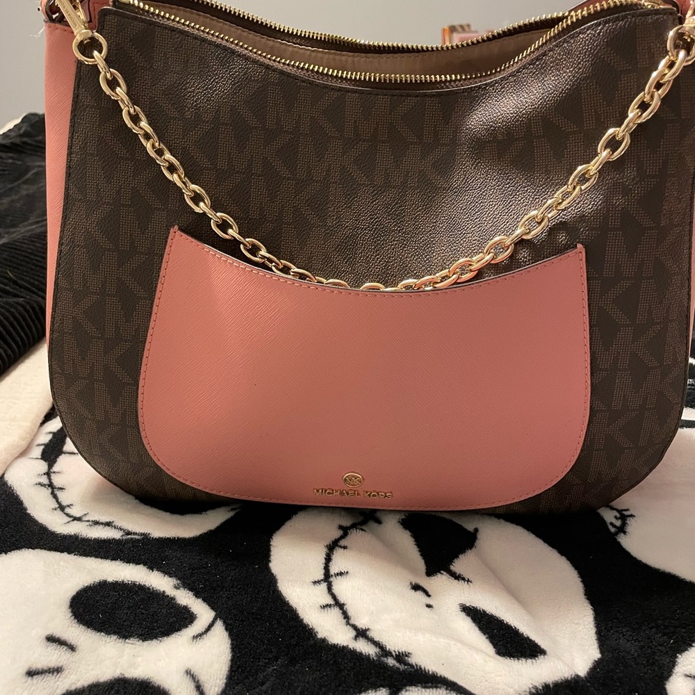 Micheal Kors purse, outside is in great condition inside has some wear.
